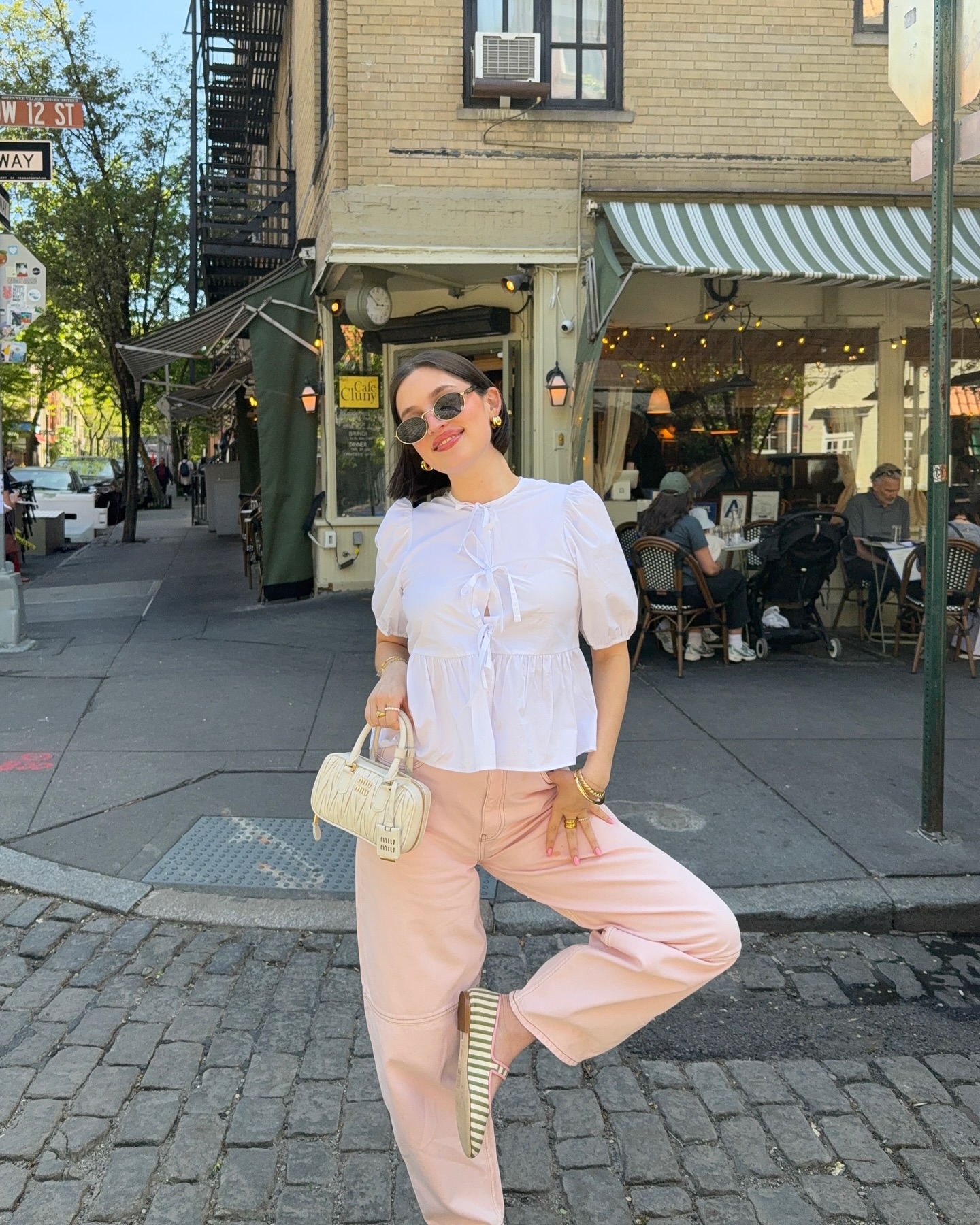 @ariannabaq wears a white blouse