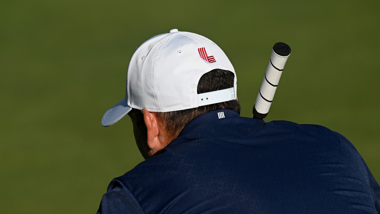 Sergio Garcia lines up a putt