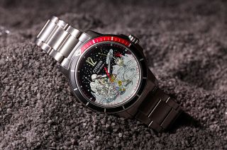 a wristwatch whose face features mickey mouse in a spacesuit exploring the surface of the moon.