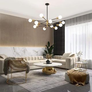 A modern living room with a sculptural, Sputnik-style light fixture