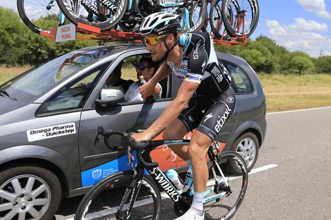 Tom Boonen back at the Omega Pharma-Quickstep team car getting bottles
