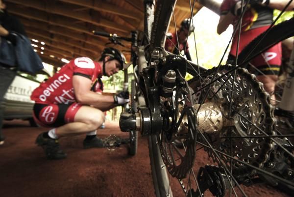 A rider prepares his bike for the Trans Andes Challenge
