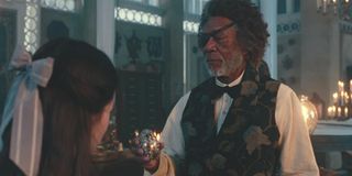 Mackenzie Foy and Morgan Freeman in The Nutcracker And The Four Realms