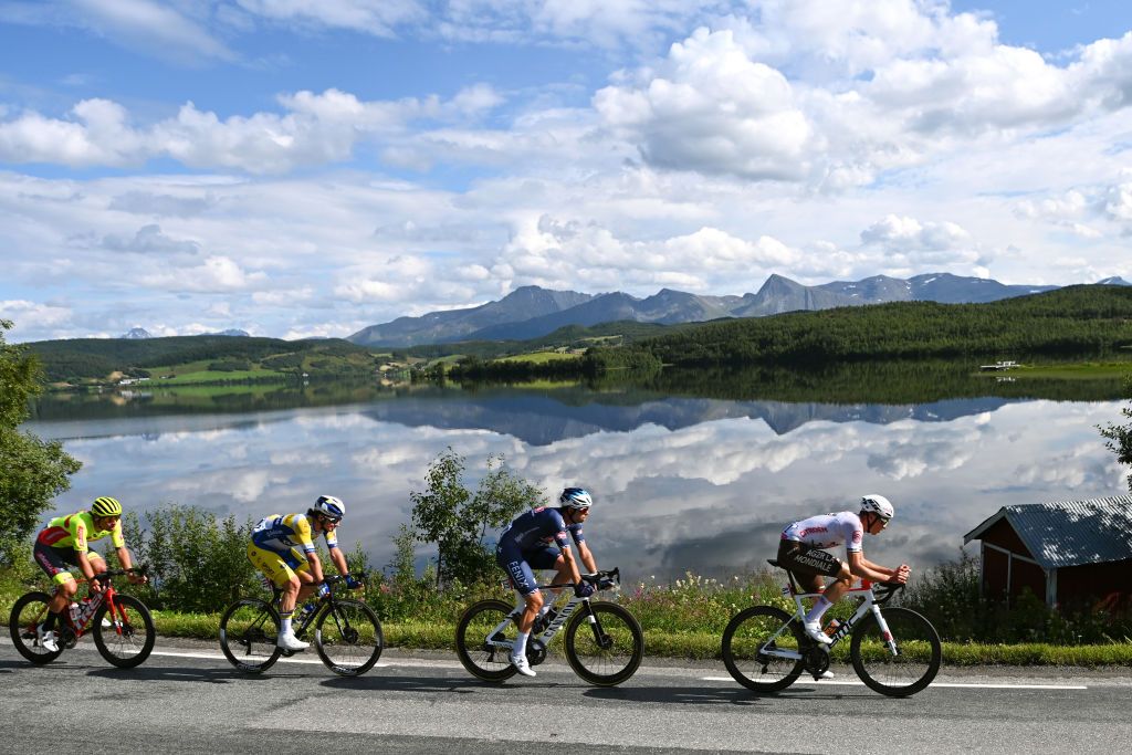 KILPISJARVI FINLAND AUGUST 06 LR Ceriel Desal of Belgium and Team Bingoal WB Cedric Beullens of Belgium and Team Sport Vlaanderen Baloise Jimmy Janssens of Belgium and Team AlpecinFenix Oliver Naesen of Belgium and AG2R Citren Team in the Breakaway during the 8th Arctic Race Of Norway 2021 Stage 2 a 178km stage from Nordkjosbotn to Storfjord Kilpisjrvi Finland ArcticRace on August 06 2021 in Kilpisjarvi Finland Photo by Stuart FranklinGetty Images