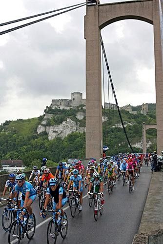 Castle ruins provide a backdrop for the bunch on a rainy afternoon.