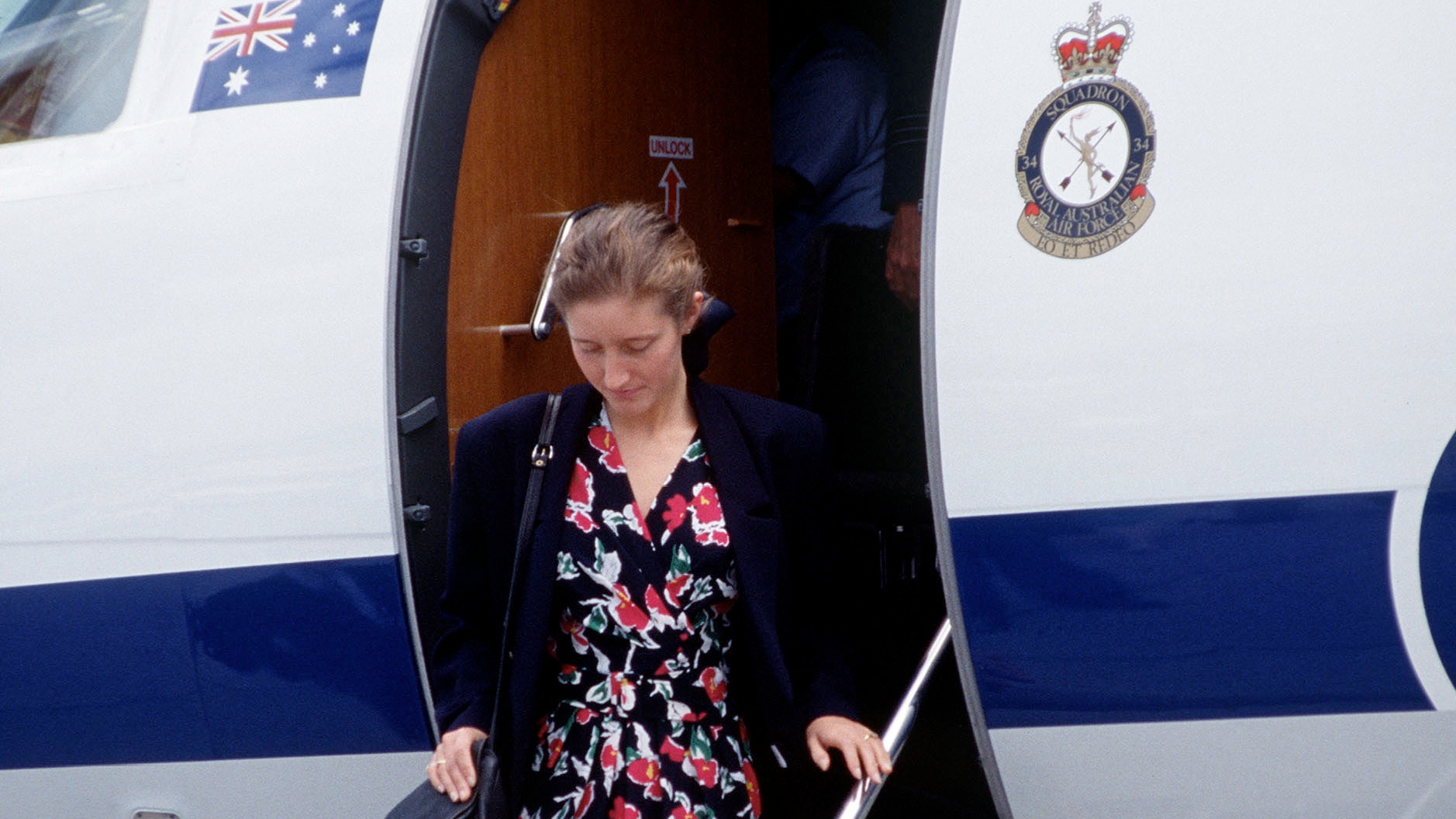 Jane Andrews leaves a plane one a royal tour with Sarah, Duchess Of York In Australia