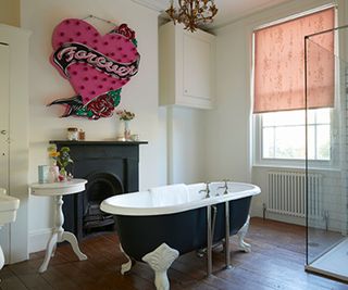 traditional bathroom with rolltop bath
