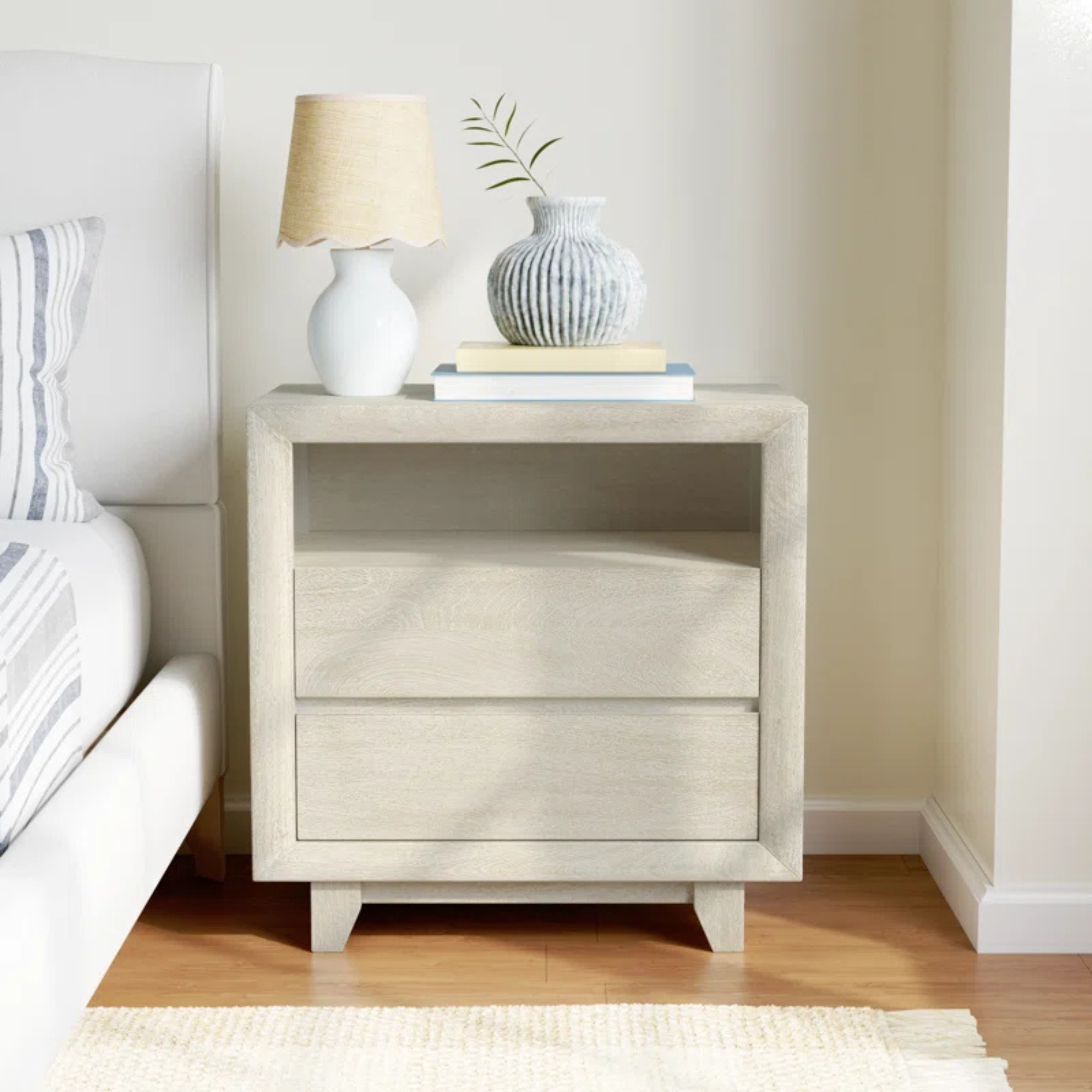 A light gray-brown nightstand with two drawers