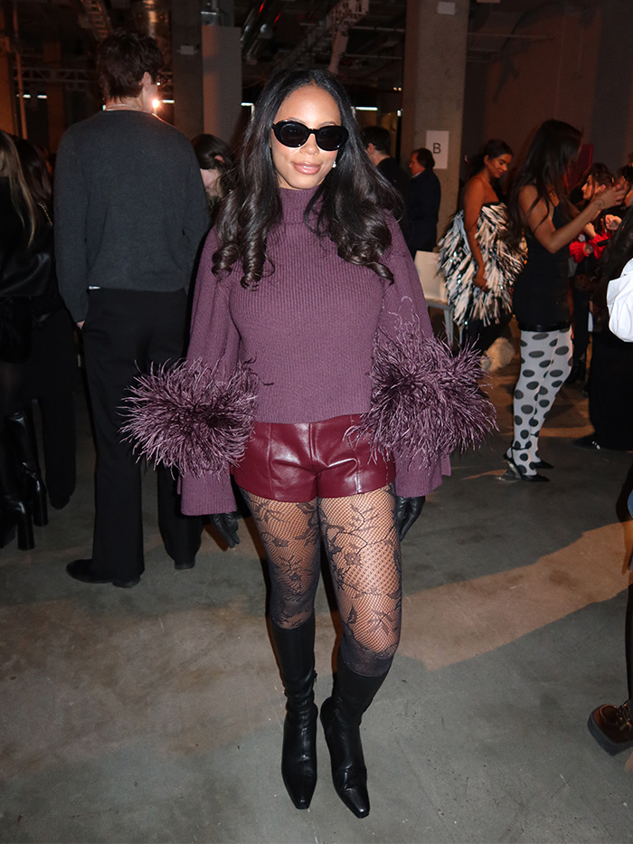 sierra mayhew, fashion editor wearing flat stretch knee high boots