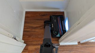 Shark Stratos Cordless vacuum flexing to fit under furniture