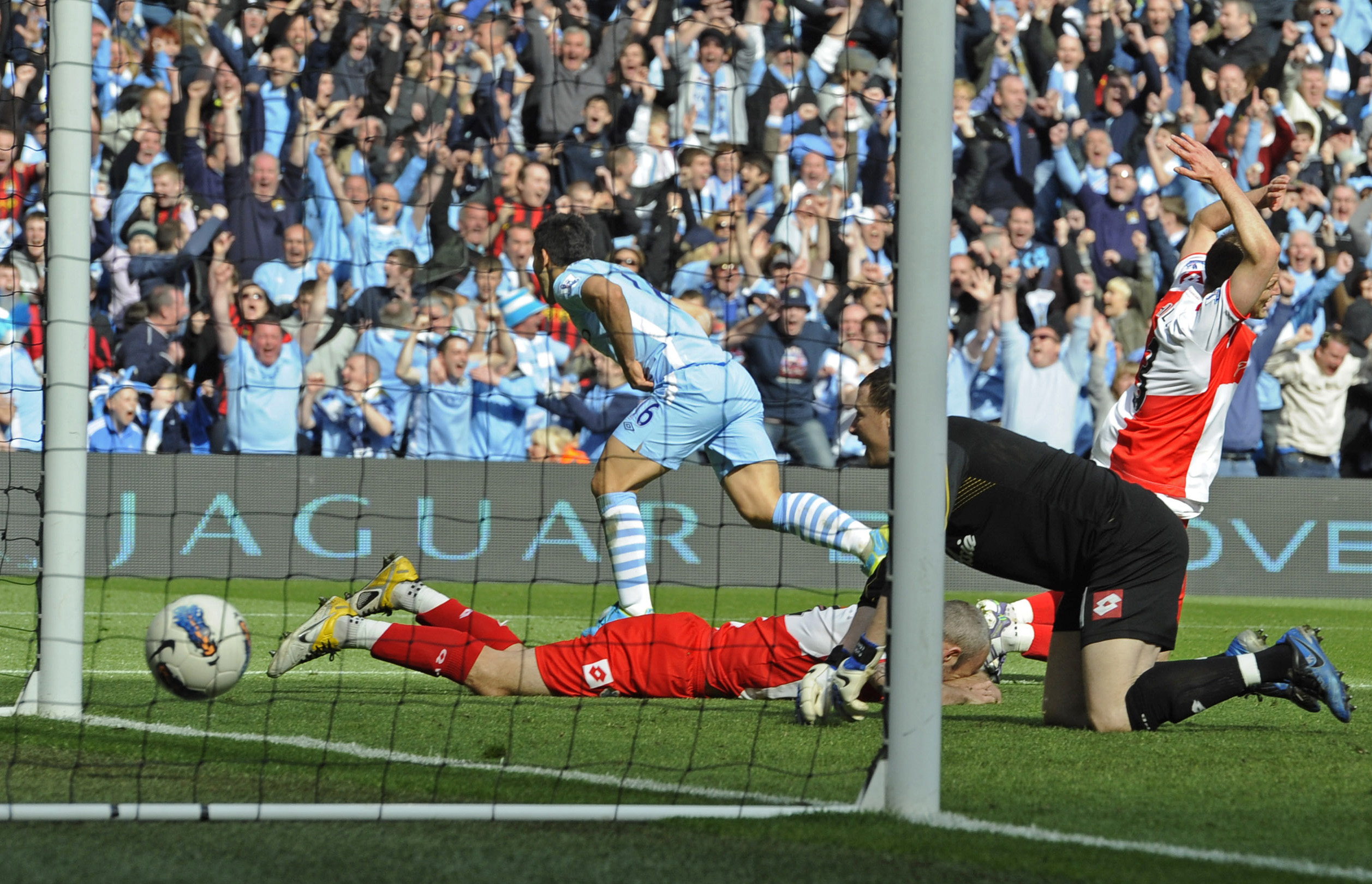 Sergio Aguero scores for Manchester City against QPR to seal a comeback win and clinch the Premier League title for the Sky Blues in May 2012.