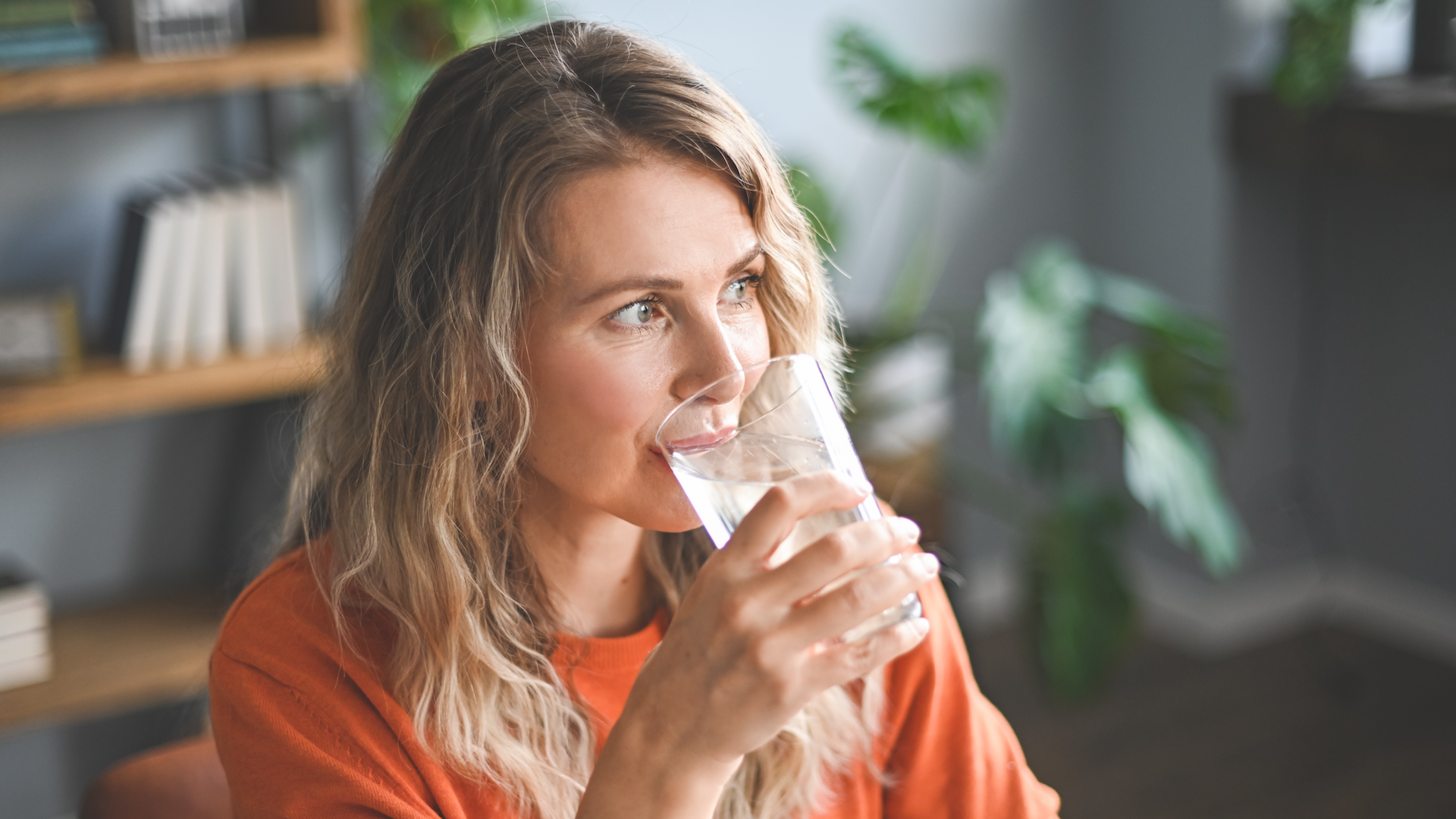 Woman drinking from a glass of water