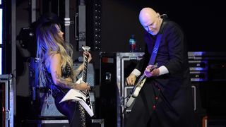 Kiki Wong and Billy Corgan of The Smashing Pumpkins perform onstage during The 33rd Annual KROQ Almost Acoustic Christmas 2024 at The Kia Forum on December 14, 2024 in Inglewood, California