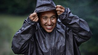 woman wearing waterproof jacket in the rain