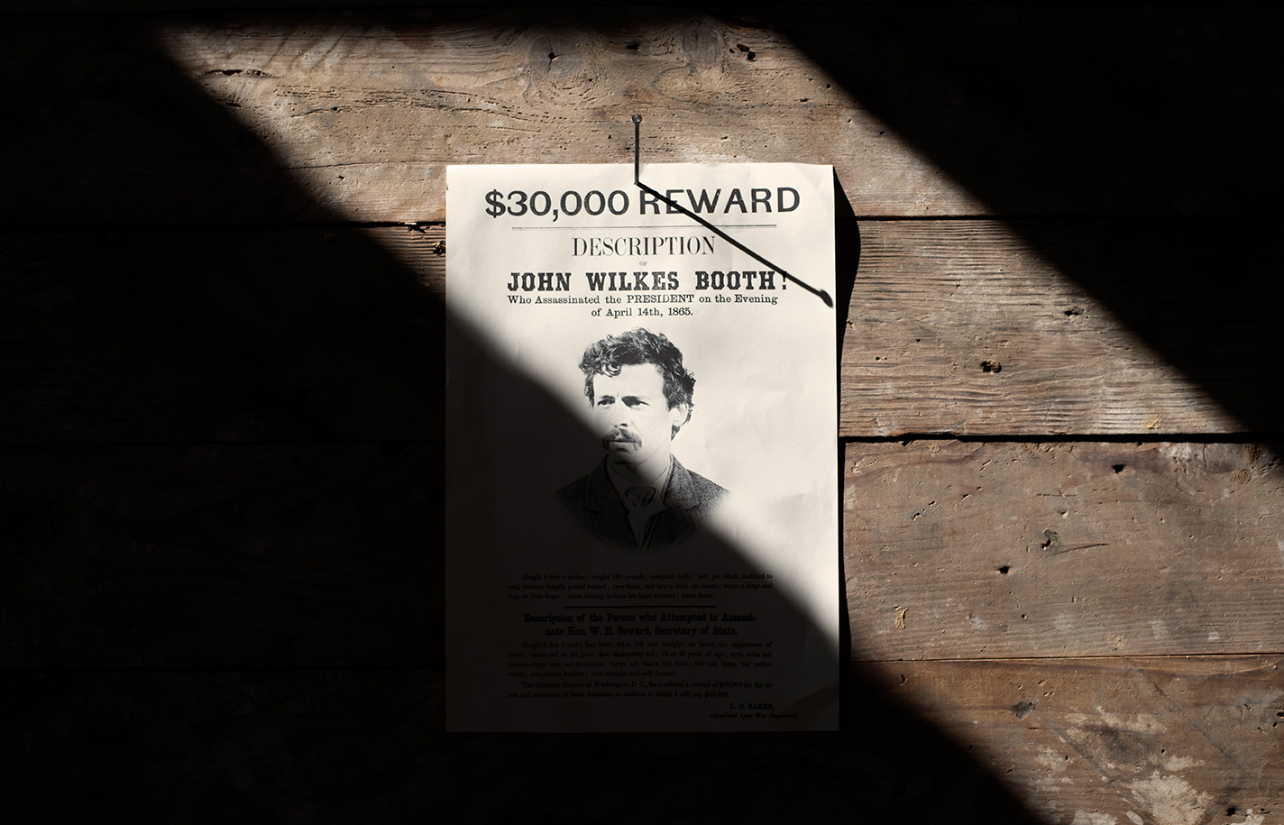 Graphic design in Apple TV's Manhunt; wanted poster