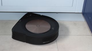 iRobot Roomba S9+ on a tiled floor
