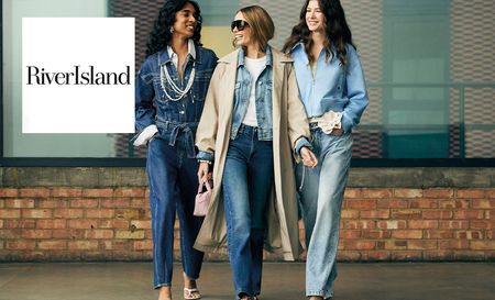 River Island logo top left with three models walking towards the camera