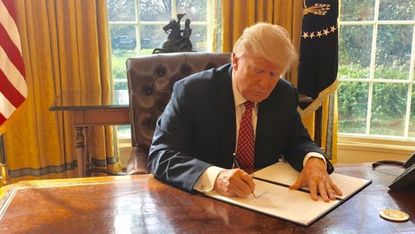 Donald Trump signs new US travel ban