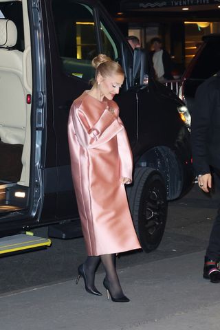 Ariana Grande wearing a pink Leset Bobbi Coat in NYC.