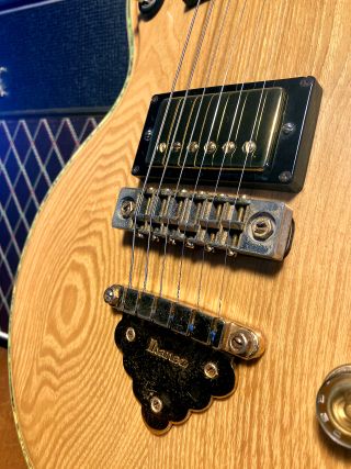 An up-close shot of an Ibanez Artist Model 2617 guitar