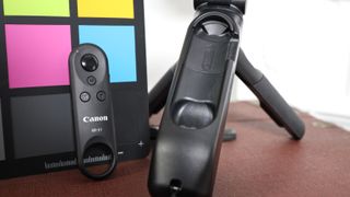 The Canon HG-100TBR Tripod Grip comes with the Canon BR-E1 Bluetooth Remote stowed in the leg