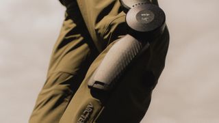 Close up of hiker testing the Arc'teryx exoskeleton hiking pants