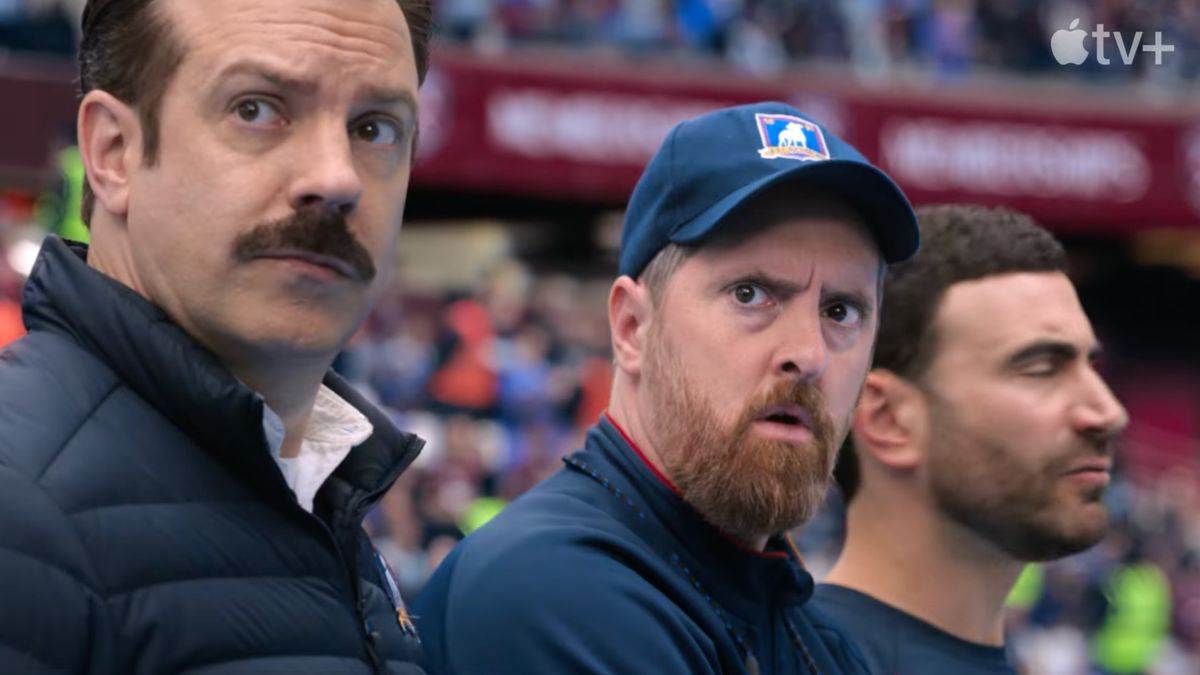 (L to R) Jason Sudeikis as Ted Lasso, Brendan Hunt as Coach Beard and Brett Goldstein as Roy Kent in the trailer for Ted Lasso