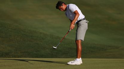 Patrick Welch of Oklahoma Sooners putts during the 2022 Division I Mens Golf Championship