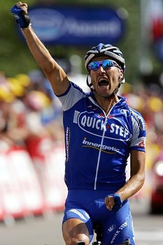 Matteo Tosatto (Quickstep) punches the air with excitement after his win.