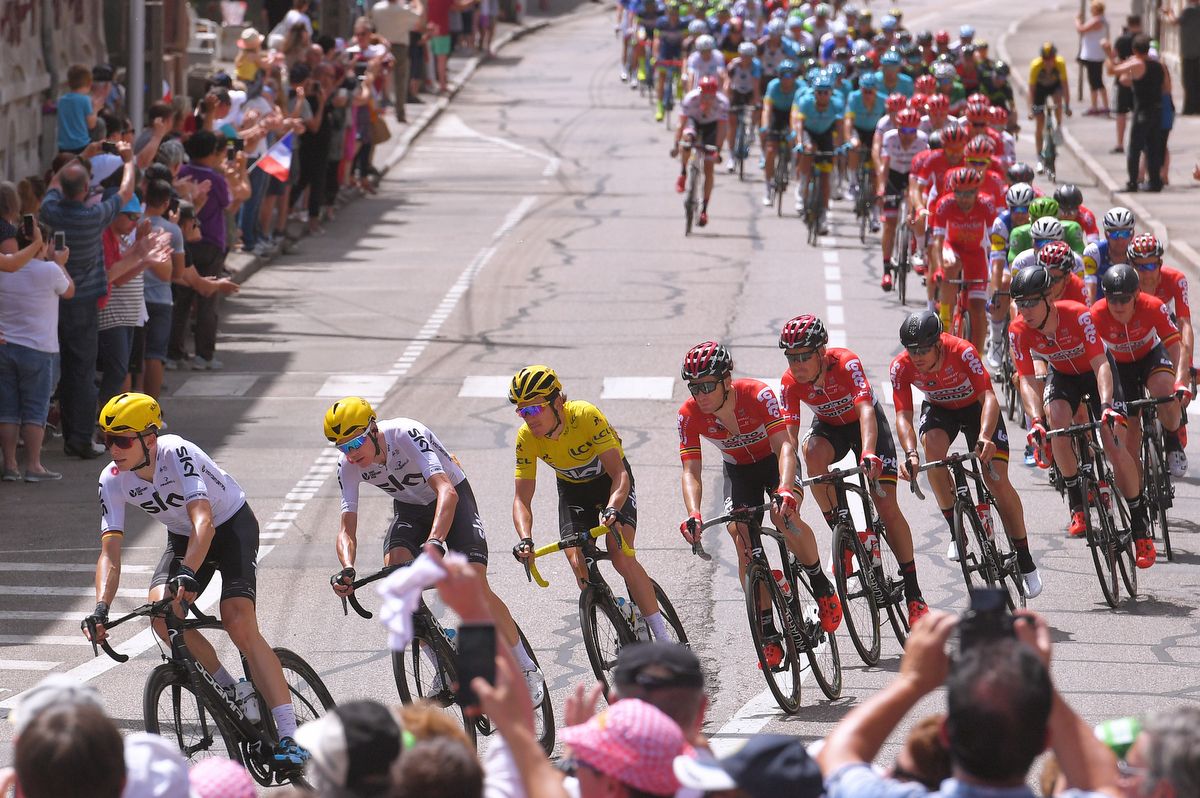 Team Sky looking after Geraint Thomas in the yellow jersey