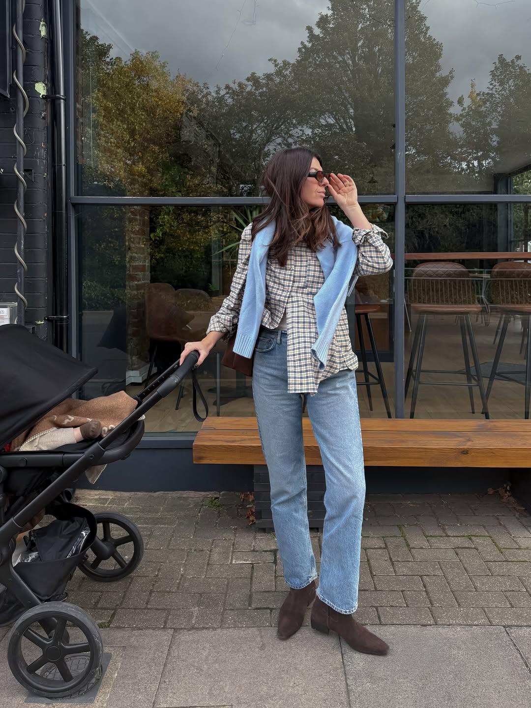 @francescasaffari wears jeans and flannel shirt