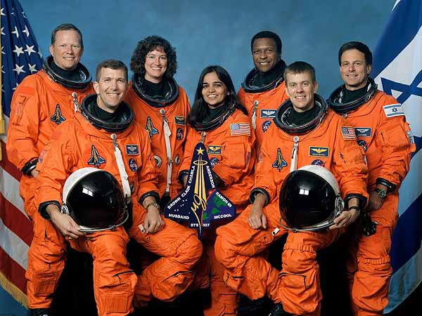An STS-107 standard image.  From left: David Brown, Rick Husband, Laurel Clark, Kalpana Chawla, Michael Anderson, William McCool and Ilan Ramon.