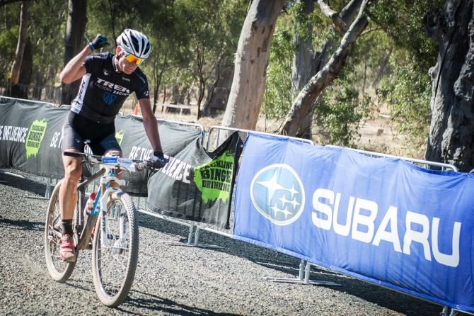 Dan McConnell wins the elite men's cross country race.