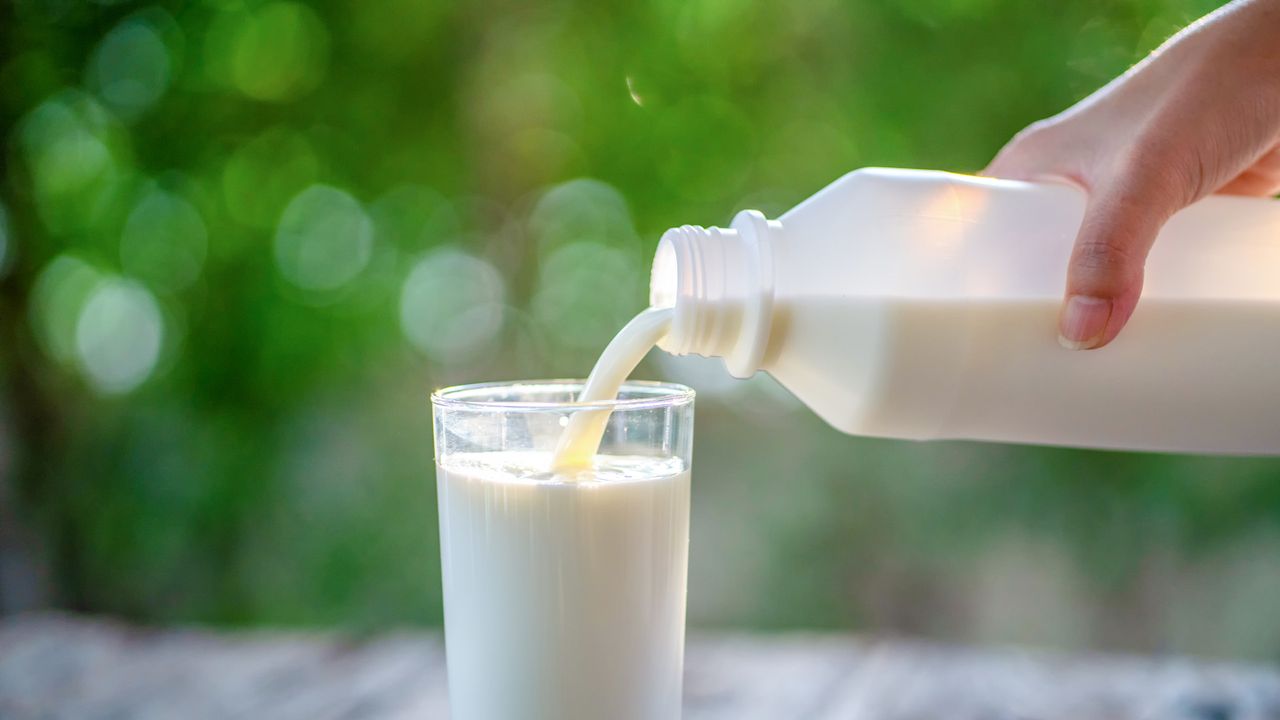 Pouring a glass of milk