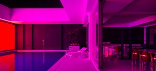 L House by AD ARCHITECTURE interior with coloured lighting