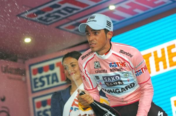 Alberto Contador uncorks the bubbly.