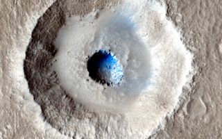 The Mars Reconnaissance Orbiter imaged an impact crater with an unusual bowl-shape depression at the center.