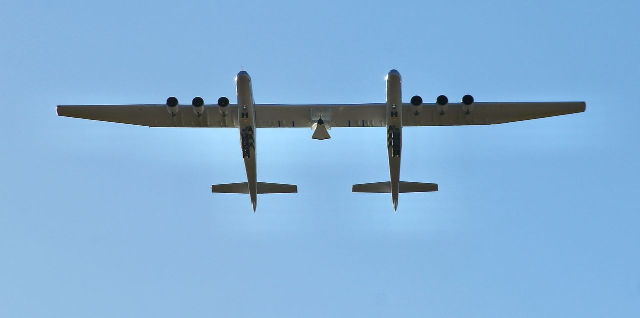 Stratolaunch's giant carrier plane Roc and its Talon-A testbed takes off from the Mojave Air and Space Port in Mojave, California on the company's first captive carry test on Oct. 28, 2022.