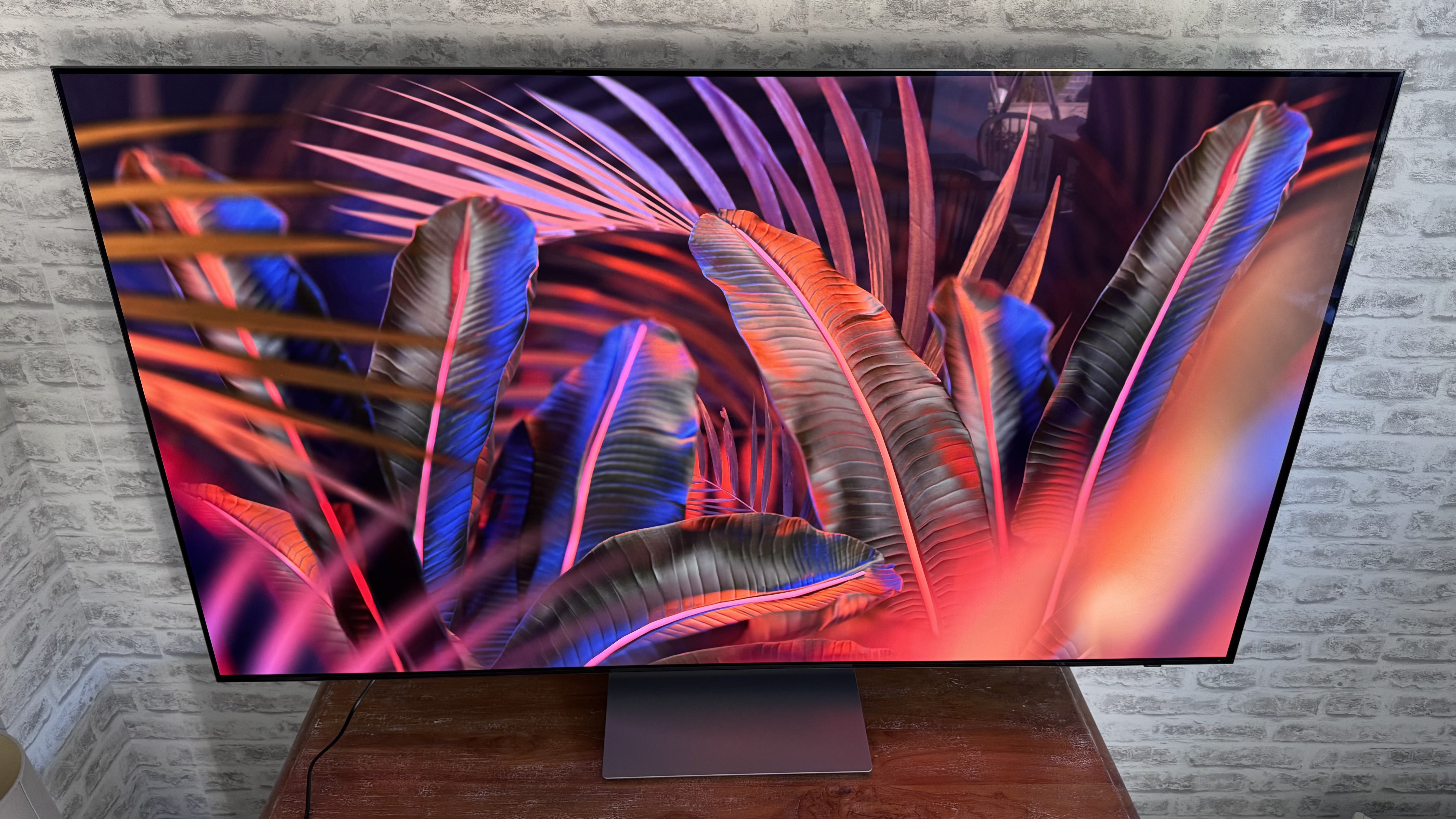 Samsung S90F showing colorful abstract image