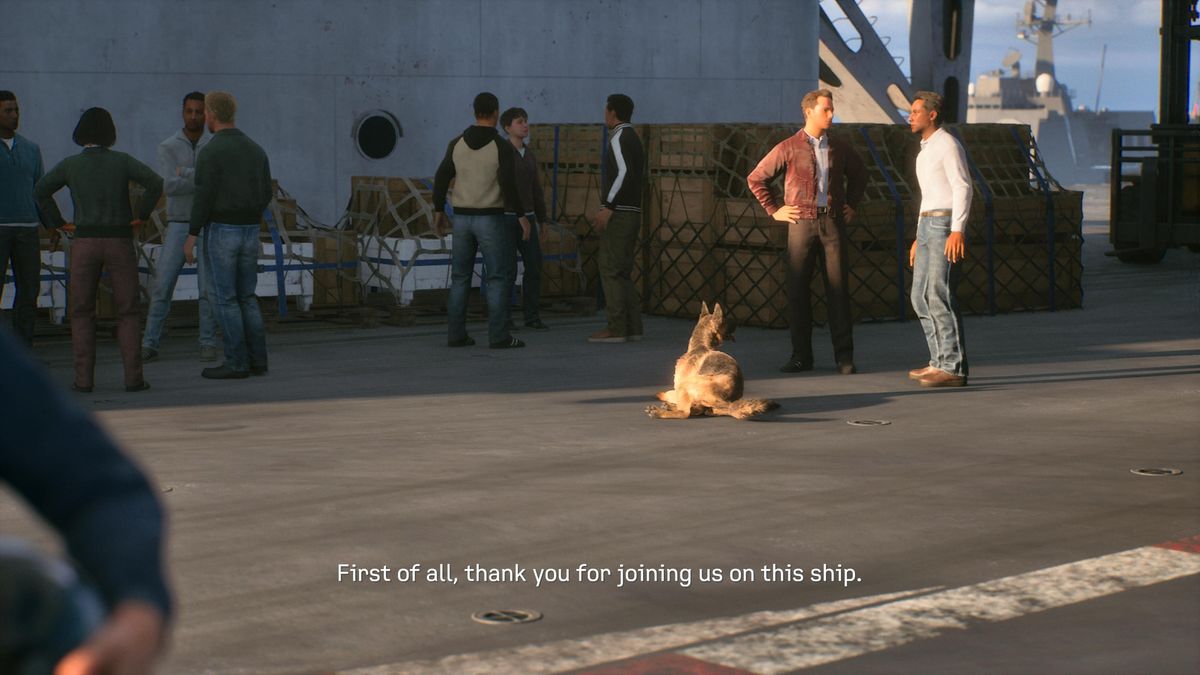Ace Combat 8 screenshot showing people talking on a carrier with a dog lying down