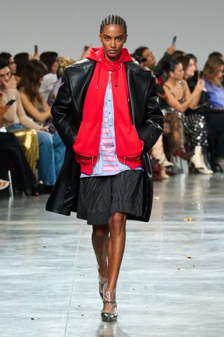 rabanne hoodie layered with a leather coat at paris fashion week spring summer 2025