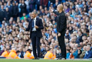 Hughton feels it would be foolish to go toe to toe with Manchester City