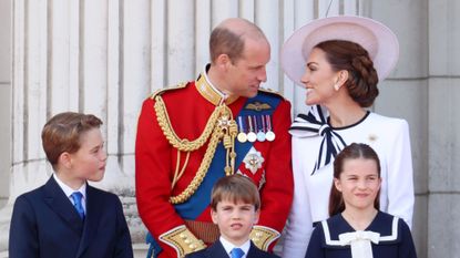 The Wales family stands on the Buckingham Palace balcony for the Trooping the Colour parade in 2024