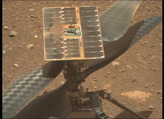Blades on the Ingenuity Mars helicopter during the unlocking process, as seen on Apr. 8, 2021.