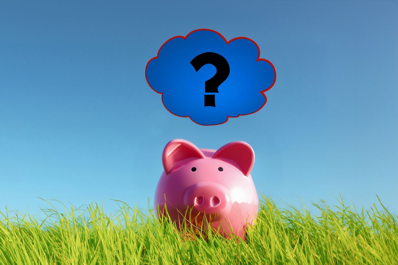 Piggy bank with question mark for doubt in saving money