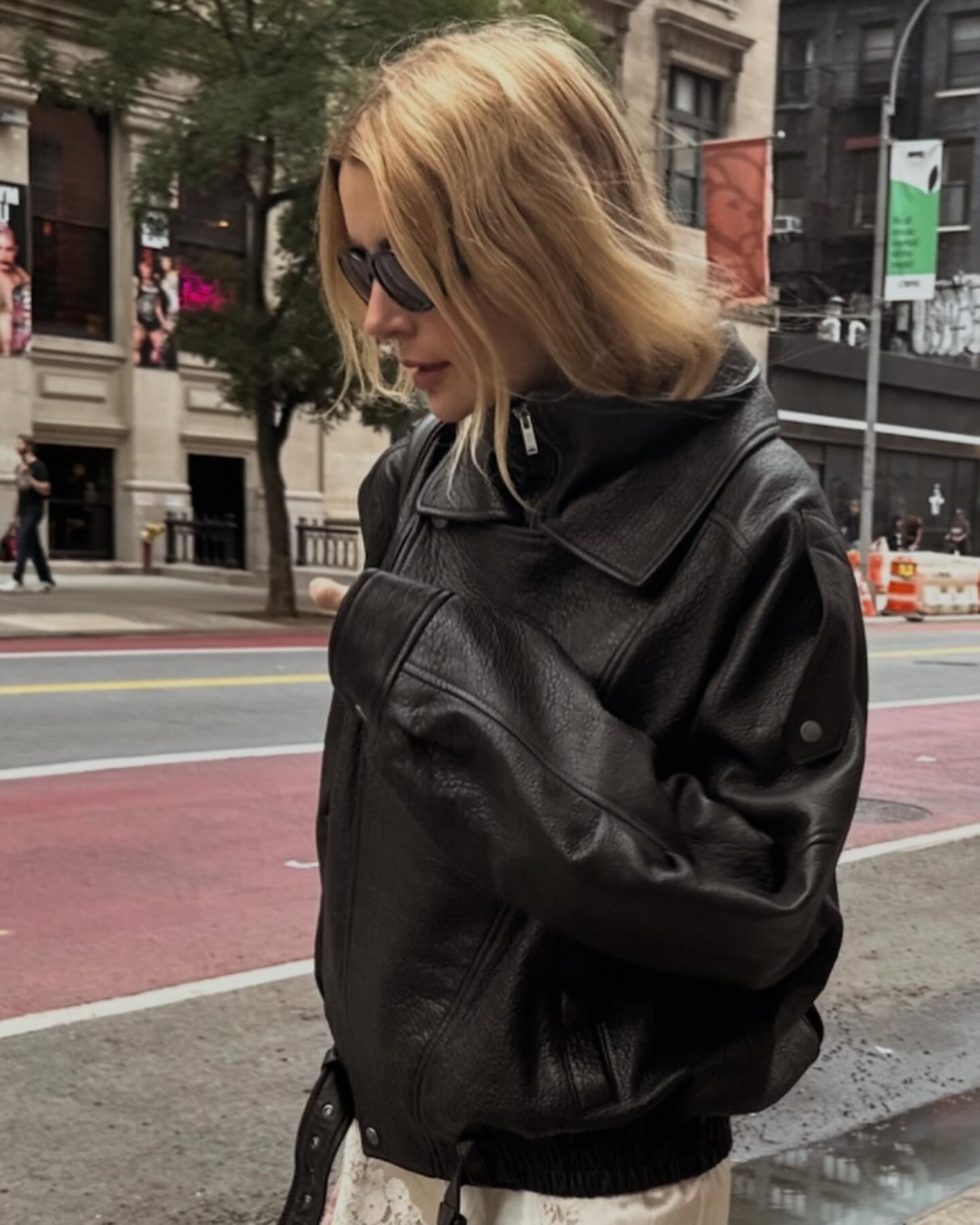 Courtney Grow wearing a leather jacket and lace-trim Doen shorts.