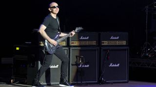 Joe Satriani onstage with his Marshall amps