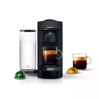 black nespresso delonghi machine pouring a coffee