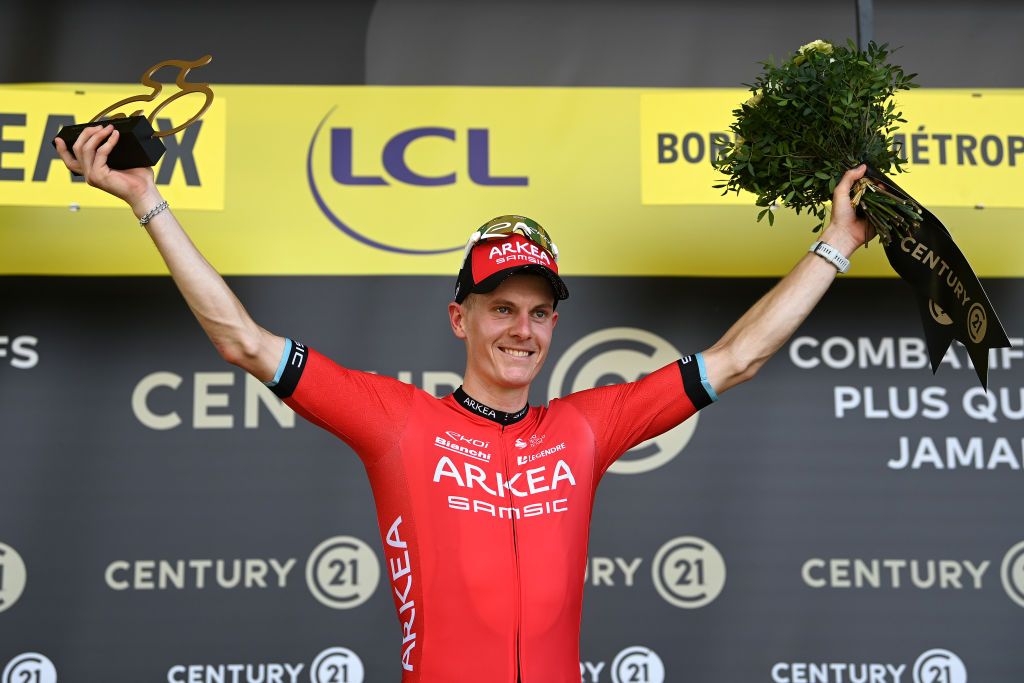 BORDEAUX FRANCE JULY 07 Simon Guglielmi of France and Team ArkaSamsic celebrates at podium as most combative rider trophy during the stage seven of the 110th Tour de France 2023 a 1699km stage from Mont de Marsan to Bordeaux UCIWT on July 07 2023 in Bordeaux France Photo by Tim de WaeleGetty Images