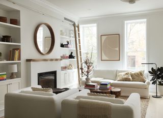 A cream toned living room with earthy elements